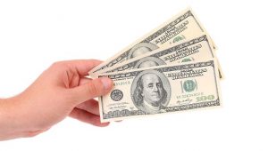 hand holding money